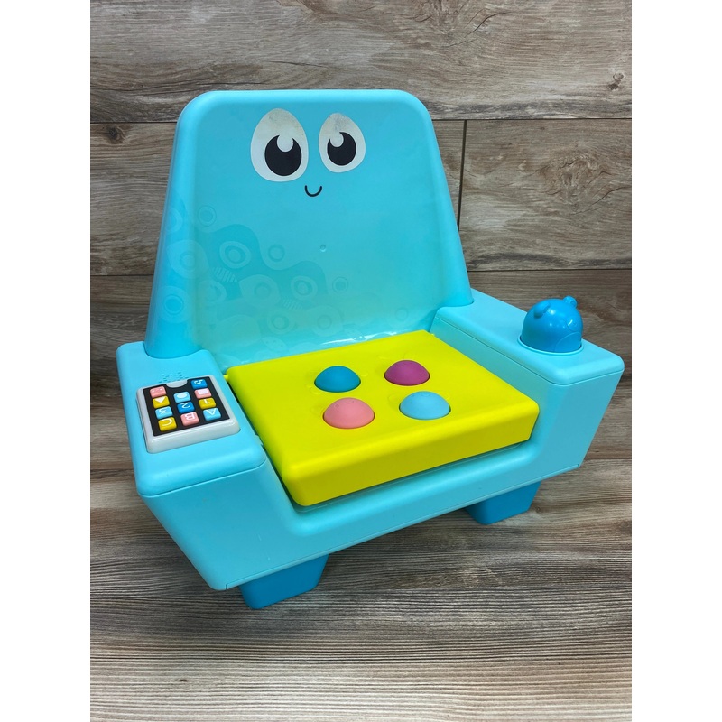 B. play Little Learner's Interactive Musical Chair